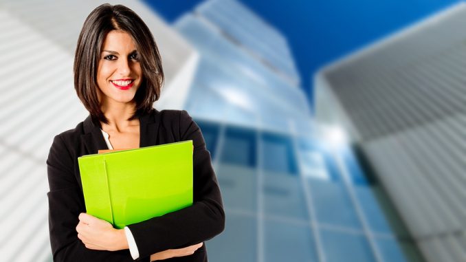 young business woman over business headquarter background